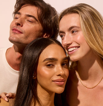 Close-up on a Group of young people focusing on glowing, hydrated skin